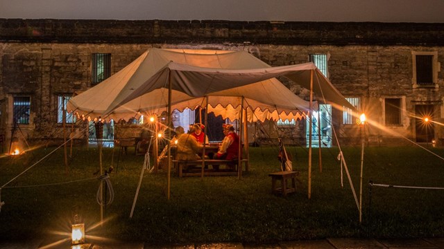 Evening program in the courtyard by candlelight