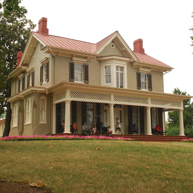 Historic two-story house on the top of a hill