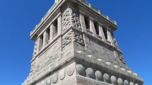 Visitors on the balcony located at the top of the pedestal.