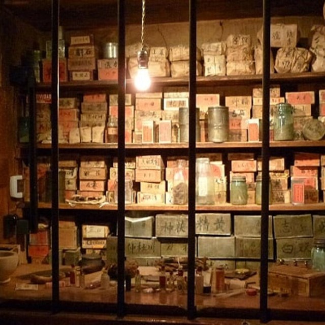 Ing Hay's apothecary window in the historic Kam Wah Chung Company Building. Photo by Ian Poellet