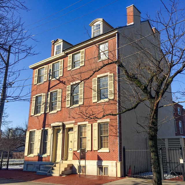 Three-story brick house