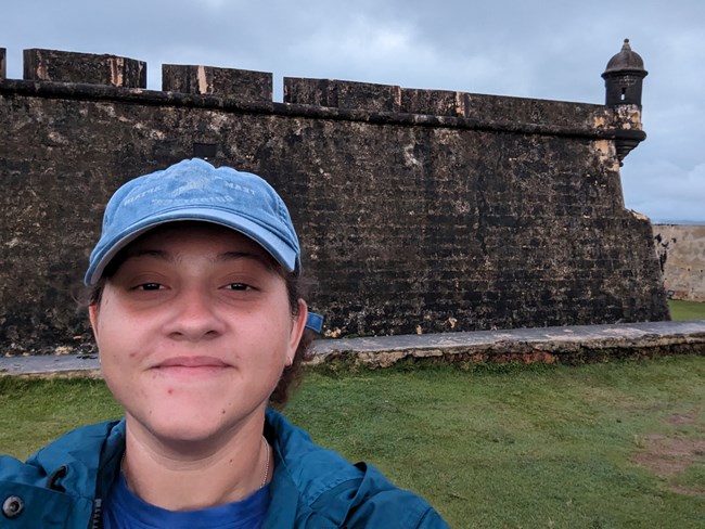 A young woman smiles in a selfie