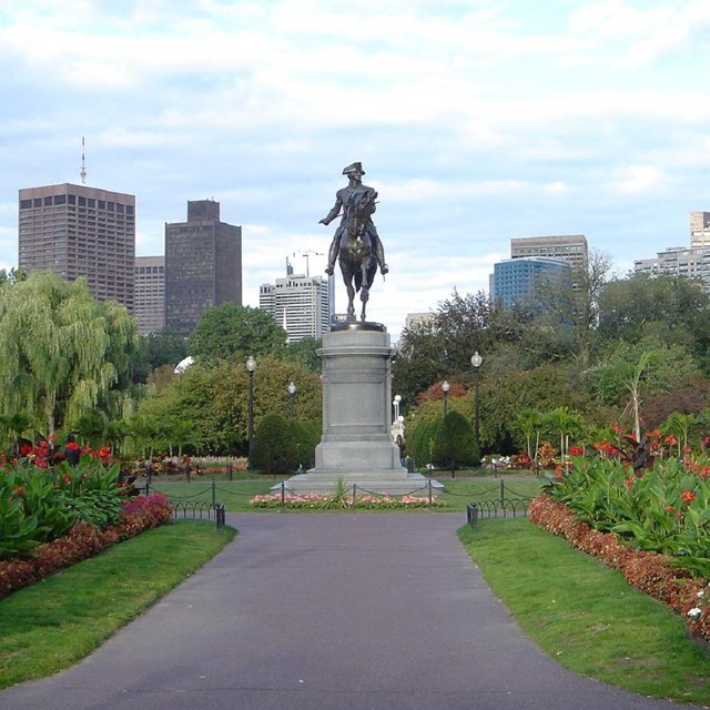 Equestrian statue in a park. 