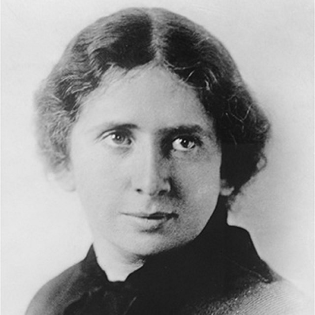 Head and shoulders portrait of a young woman with brown hair.