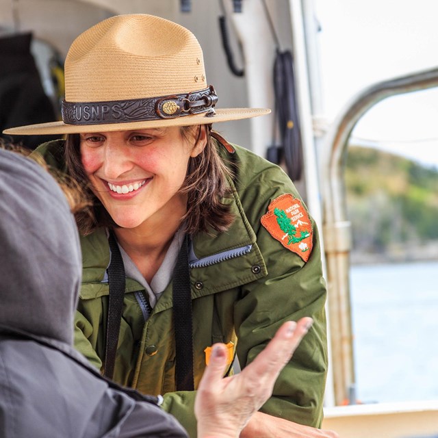 Park ranger smiling and sharing information