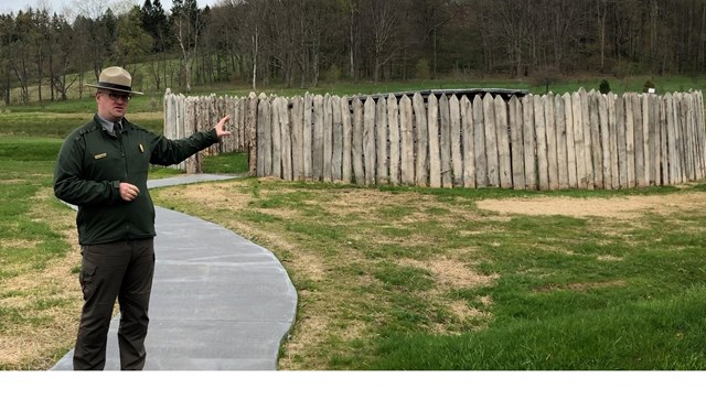 Park Ranger standing in front of Fort Necessiy