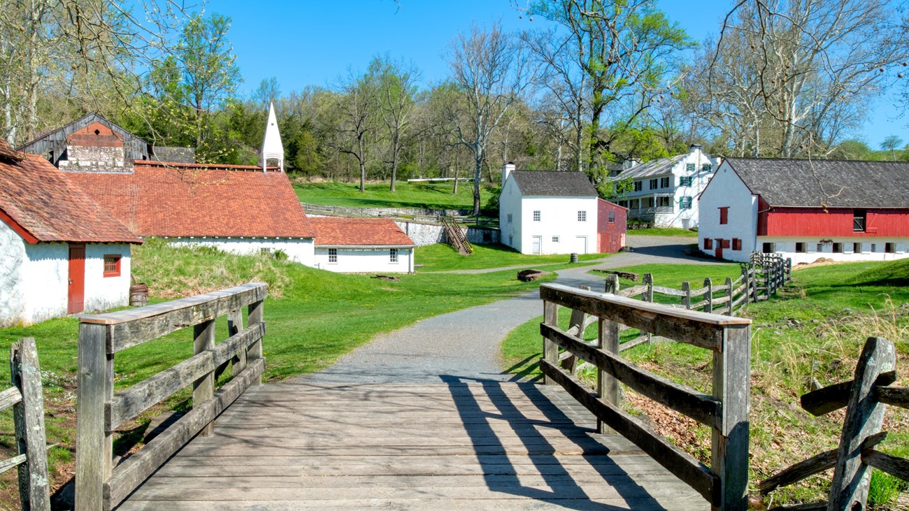 A view of the iron plantation looking towards the Cast House, Barn, and Iron Master's Mansion.