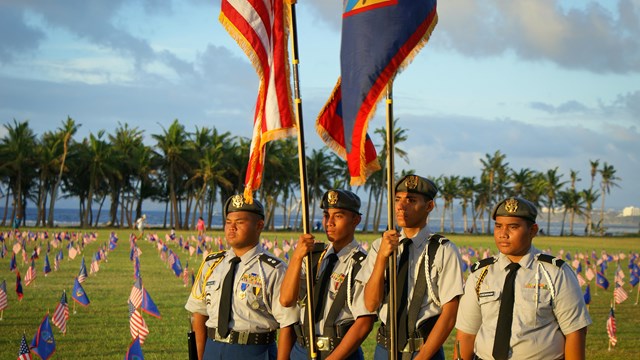 Honor Guard lined up in a military cemetery 