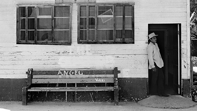 Man hangs in the doorway of building on Alcatraz