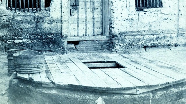 Black & White image of Castillo's well in 1875