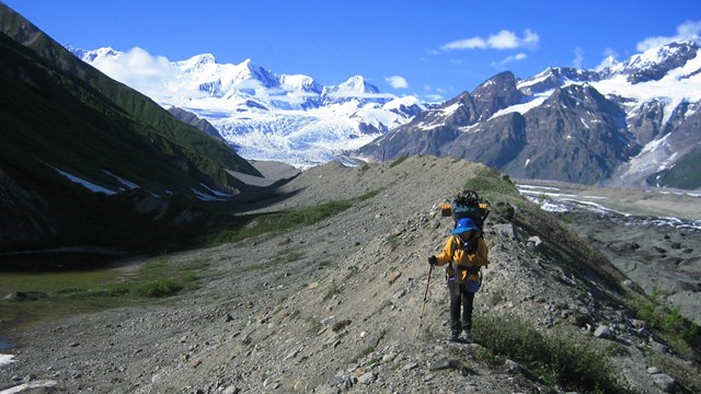 hiker on glacial moraine