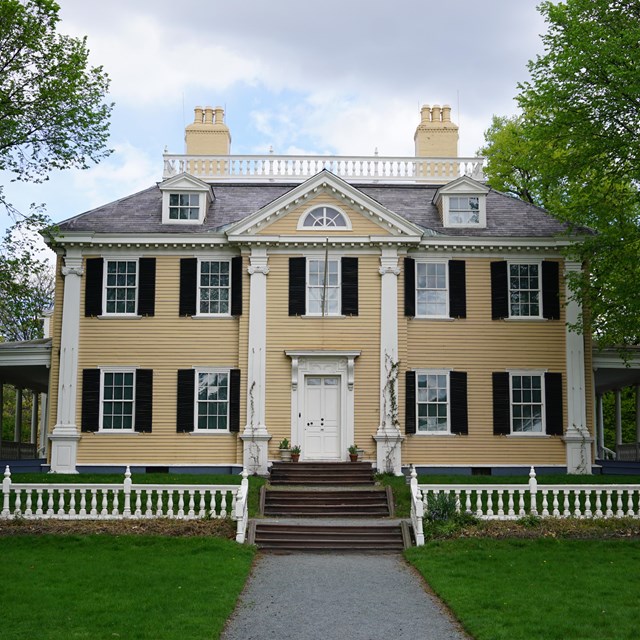 Front facade of yellow Georgian house