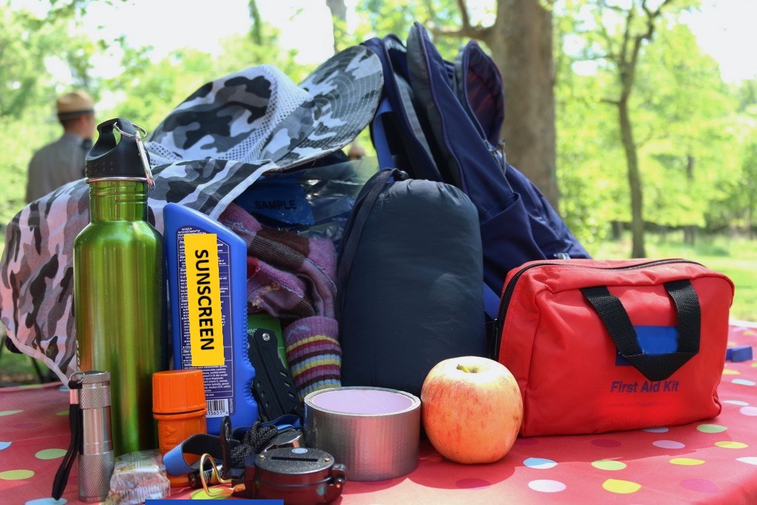 The 10 essentials set up on a table.