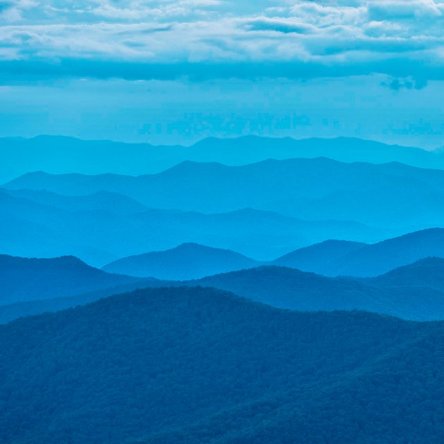 Ridges of mountains stretch to the horizon 