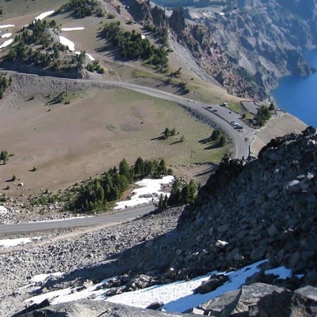 West Rim Drive with lake and landscape views