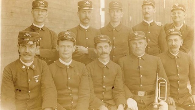 A black and white photo of a group of soldiers.