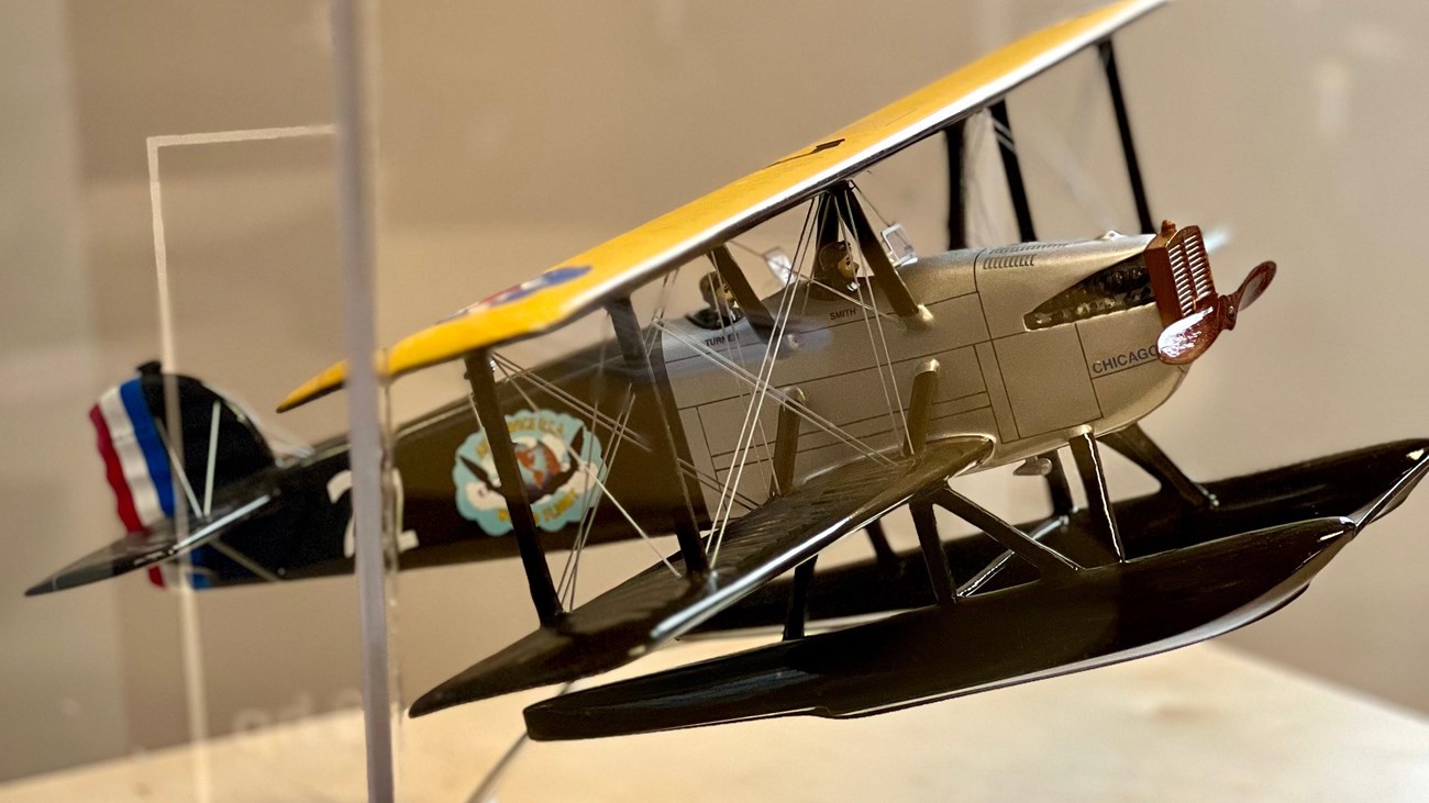 A model Douglas World Cruiser in an exhibit case.