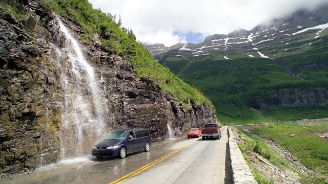 Cars drive below Weeping Wall