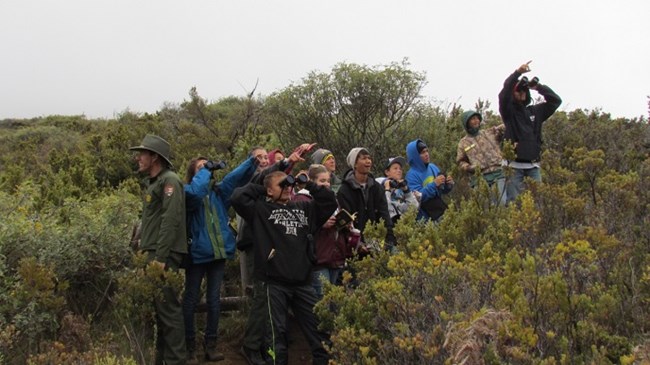 Ranger with a group of students.