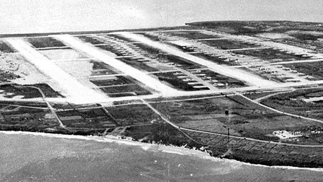 Four parallel runways surrounded by water