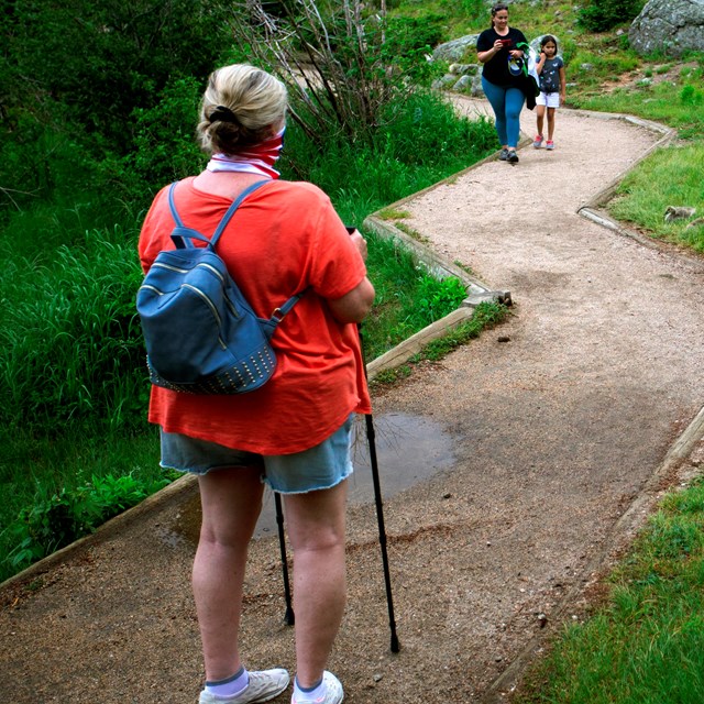 Visitor walking on a hiking trail