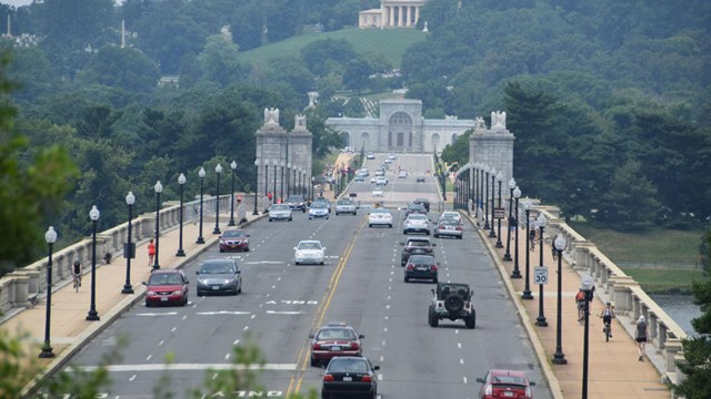 looking across potomac river, bridge on right, washington monument in left background