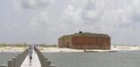 Fort Massachusetts and the West Ship Island boardwalk on a July afternoon.