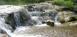 Water falling over a cascade along Travertine Creek