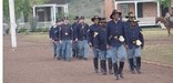 Frontier Army reenactors march during the Fort Davis Sesquicentennial Celebration held in October 2004.