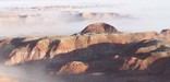 Painted Desert filled with clouds during a temperature inversion. Photo by Marge Post/NPS.