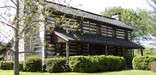 View of two-story chinked log home, John Brown Tavern, on the route of the Bell and Drane detachments, Chattanooga, Tennesee
