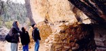 Visitors admire an Island Trail dwelling