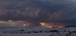 heavy storm clouds over the dunes