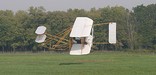 Replica Wright Flyer III demonstrating a turn.