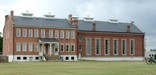 the park's Visitor Center is housed in the former barracks/courthouse/jail buildings