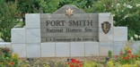 entrance sign at Visitor Center parking lot