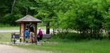 Bicyclists pause at a kiosk in Fort Snelling State Park.