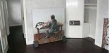 Photo of drawing Poe at desk with cat