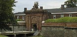 Fort Jay's red sandstone archway is one of the oldest structural elements of the fort dating to the late 18th century.
