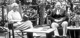 Herbert and Lou Henry Hoover relax on the porch of the Brown House in historic Rapidan Camp.