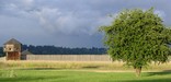 Fort with storm clouds in background