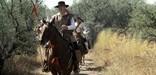 Anza Trail reenactors riding horses