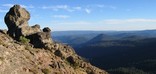 rock formation on top of diamond peak with panoramic of valley below