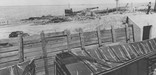 Crushed box car still in a revetment the day after the explosion on July 18, 1944 - Navy Photo