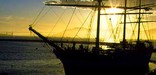 Sailing ship Balclutha at Hyde Street Pier at sunset.