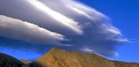 Lenticular clouds over Sierra Nevada.-- Peter Stekel Photo