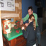 Picture of a man and his daughter playing with Lincoln Logs