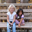 A picture of kids taking a break along the boardwalk at the Birthplace Unit