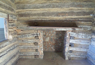 Fireplace inside Symbolic Cabin located in Memorial Building