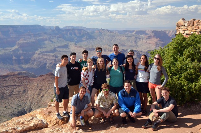 Group of interns standing on an overlook of the Grand Canyon